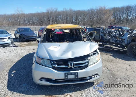 2014 Honda Odyssey Lx z USA, uszkodzony, nr VIN 5FNRL5H25EB004409